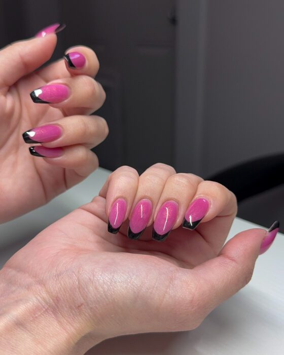 The finished set seen straight on, the black French repeated across all ten nails.