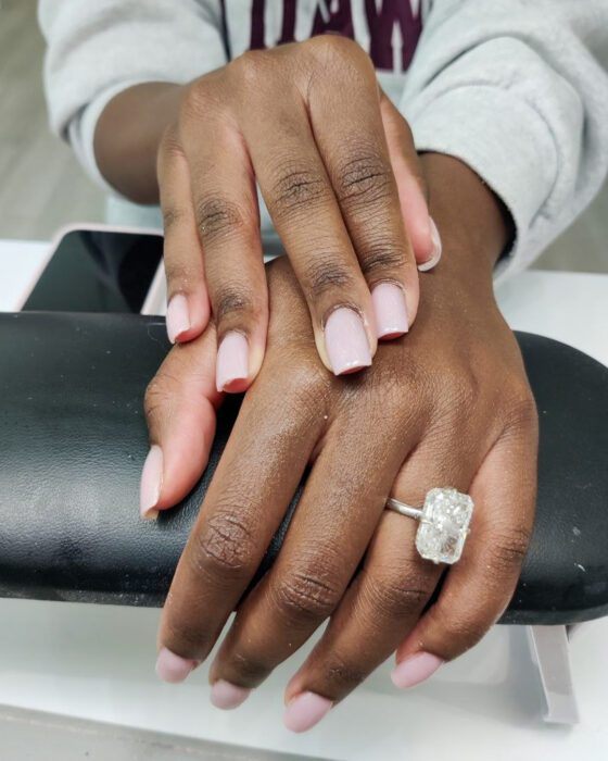 A second view of the same plain nude-pink square set.