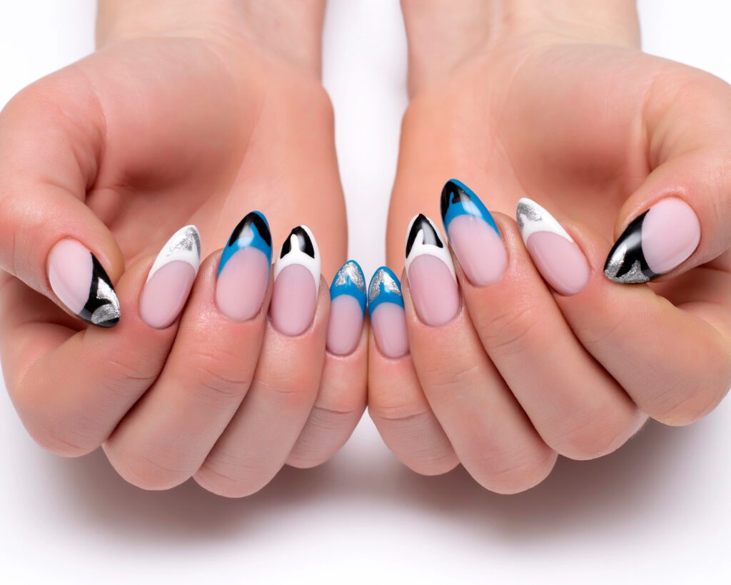 Two hands held together showing almond nails in white, black and blue graphic line art